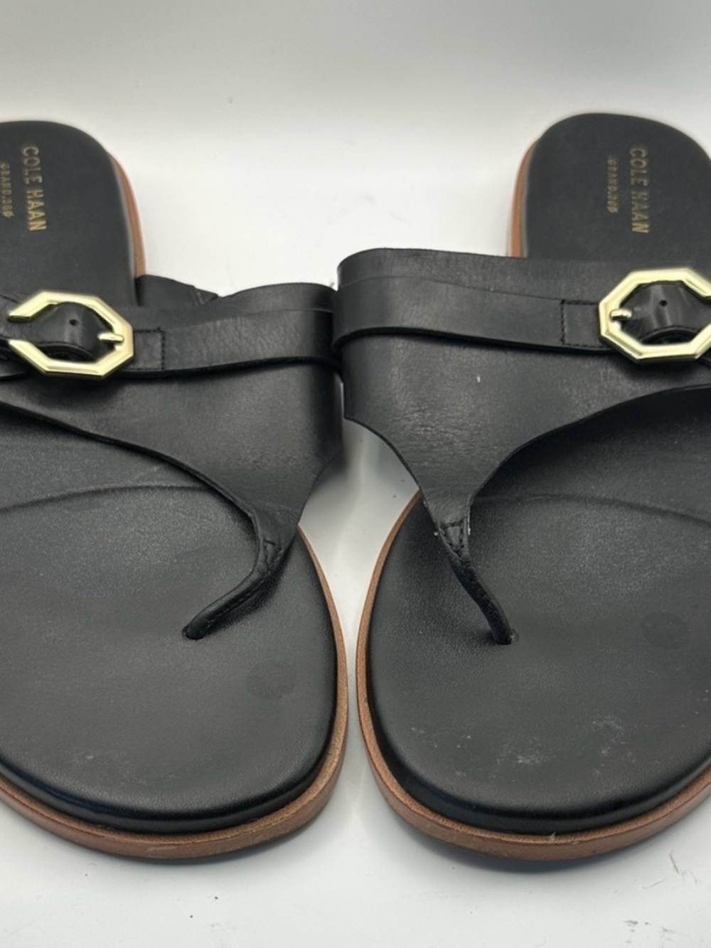 Cole Haan Grand.360 Black Leather Thong Sandals with Gold Buckle